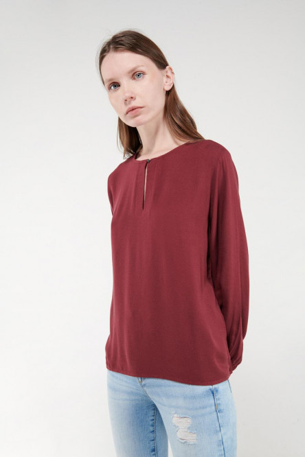 Blusa unicolor manga larga