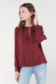 Blusa unicolor manga larga
