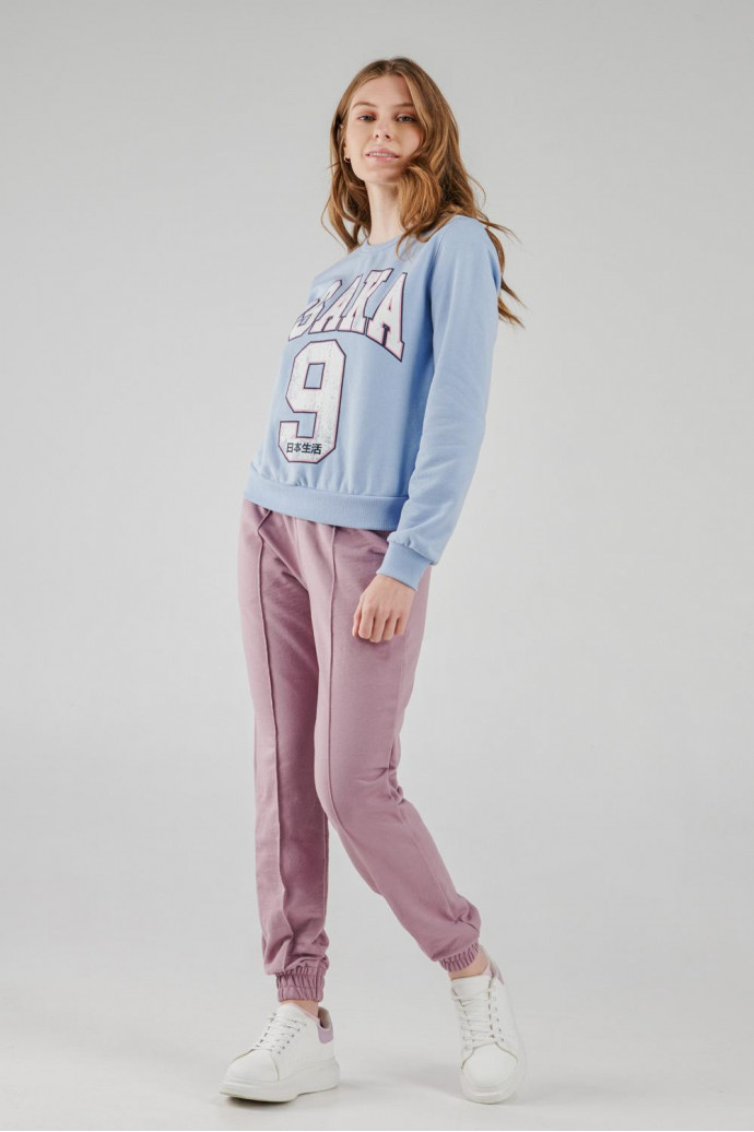 Pantalon jogger, unicolor, con bolsillos en costado
