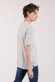 Camiseta básica para hombre manga corta, unicolor, con doble doblez en mangas y abertura lateral dispareja.