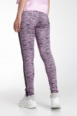 Leggins largos con sesgos laterales, con estampado de animal print.