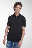 Camiseta Polo unicolor con cuello neru y puños tejidos