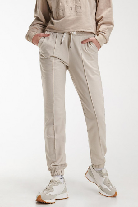 Pantalon jogger, unicolor, con bolsillos en costado