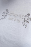 Camiseta unicolor, manga larga con cuello redondo.
