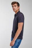 Camiseta Polo unicolor cuello en tela cuerpo.