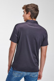 Camiseta Polo unicolor cuello en tela cuerpo.