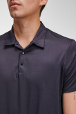 Camiseta Polo unicolor cuello en tela cuerpo.