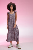 Vestido estampado con cortes y cordón para anudar en espalda.