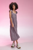Vestido estampado con cortes y cordón para anudar en espalda.