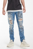Jean Skinny azul medio con rotos y estampado
