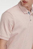 Camiseta polo manga corta rosada y cuello tejido