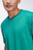 Camiseta básica para hombre manga corta, unicolor, con doble doblez en mangas y abertura lateral dispareja.