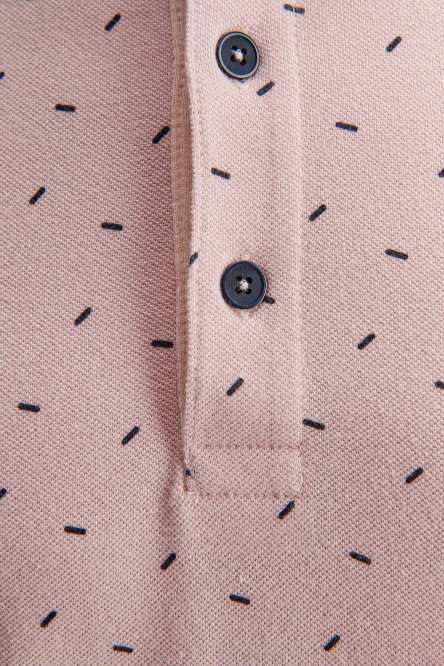 Camiseta Polo estampada con cuello y puños tejidos.