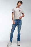 Jean skinny con rotos y estampado de Snoppy