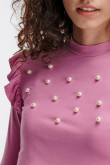 Camiseta unicolor, manga larga con cuello alto.