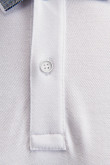 Camiseta Polo unicolor con cuello y puños tejido