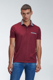 Camiseta Polo unicolor con cuello tejido.