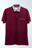 Camiseta Polo unicolor con cuello tejido.