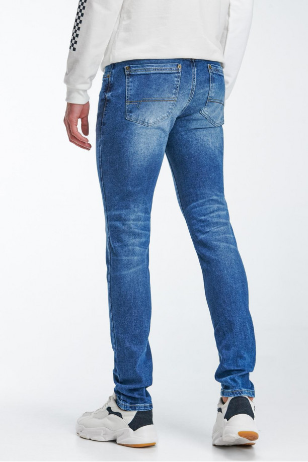 Jean Skinny Fit tiro bajo azul oscuro con rotos