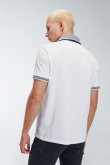 Camiseta Polo unicolor con cuello y puños tejido con diseño