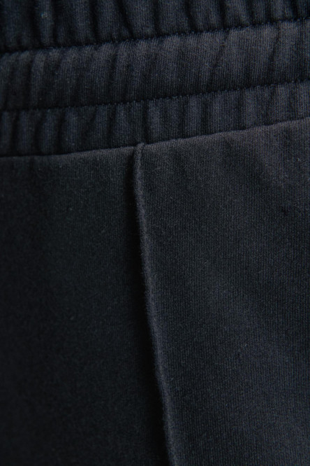 Pantalon jogger, unicolor, con bolsillos en costado