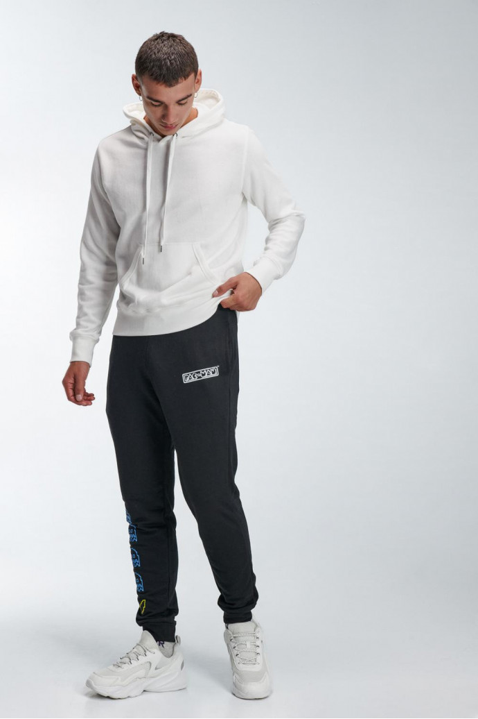 Pantalón, con estampado en frente de Pacman.