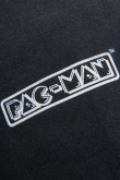 Pantalón, con estampado en frente de Pacman.