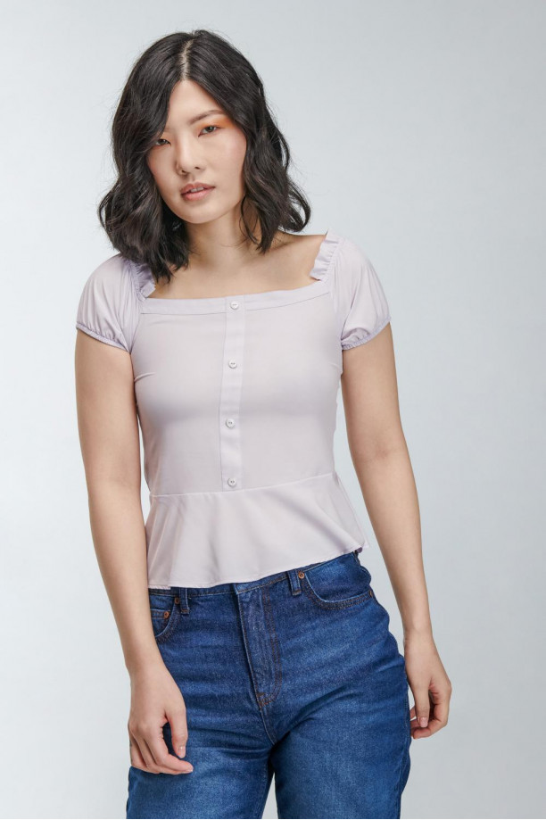 Blusa para dama con abotonadura en frente unicolor.