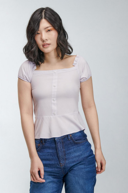 Blusa para dama con abotonadura en frente unicolor.