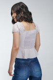 Blusa para dama con abotonadura en frente unicolor.