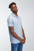 Camiseta Polo estampada con cuello y puños tejidos.