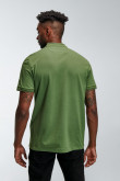Camiseta Polo unicolor con cuello y puños tejidos, manga corta con  pechera de dos botones.