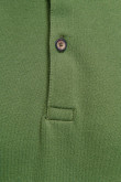 Camiseta Polo unicolor con cuello y puños tejidos, manga corta con  pechera de dos botones.