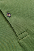 Camiseta Polo unicolor con cuello y puños tejidos, manga corta con  pechera de dos botones.