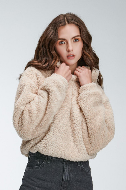Buzo para mujer sin estampado, con capota y elástico en ruedo.