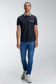 Camiseta Polo unicolor con cuello tejido.