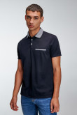 Camiseta Polo unicolor con cuello tejido.