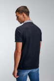 Camiseta Polo unicolor con cuello tejido.