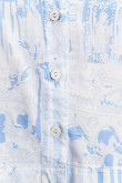 Blusa con abotonadura en frente elástico en mangas y puños.