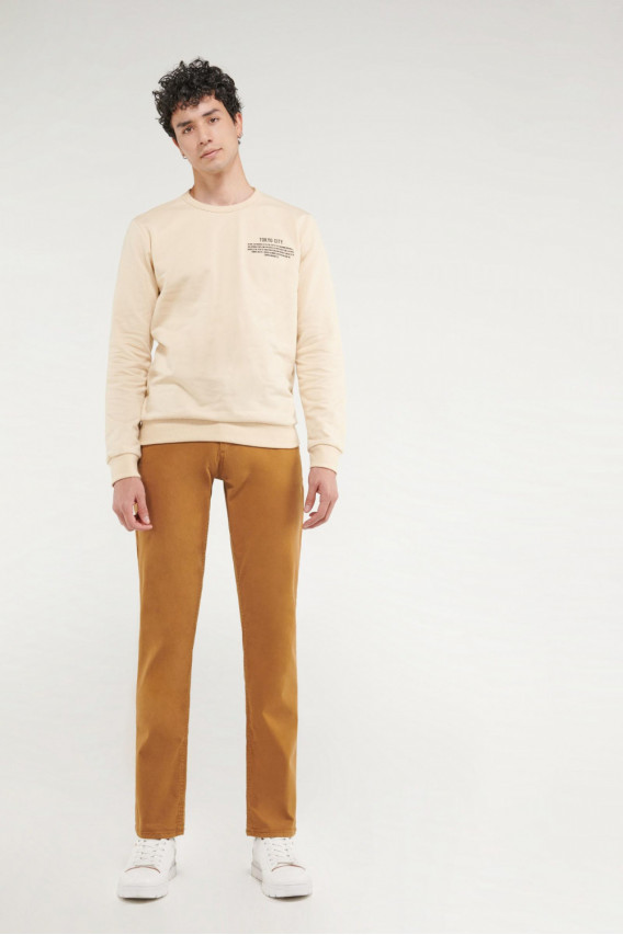 Pantalón unicolor tipo chino slim