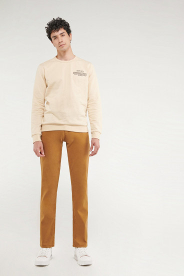 Pantalón unicolor tipo chino slim