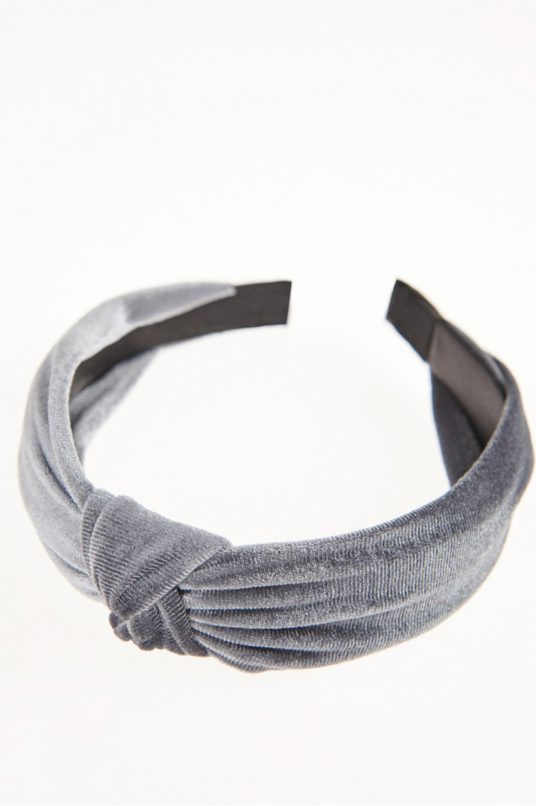 Diadema tela acabado brillante.