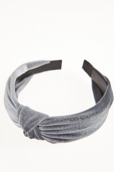 Diadema tela acabado brillante.