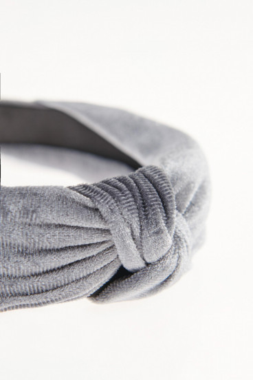 Diadema tela acabado brillante.