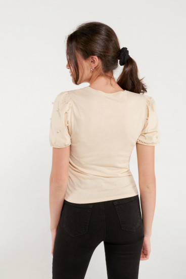 Camiseta manga corta estampada con perlas.