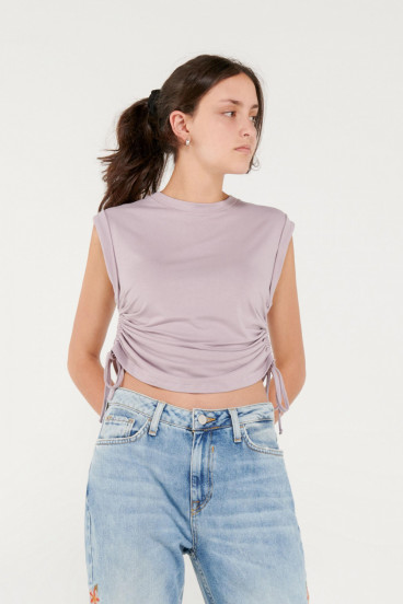 Camiseta sin mangas con recogido en costados.