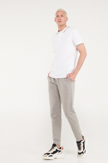Camisa Polo básica unicolor con cuello y puños tejidos