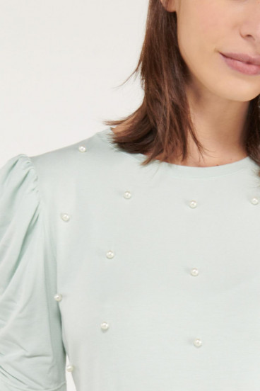 Camiseta manga corta unicolor con perlas.