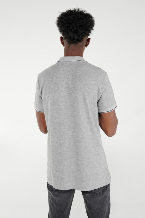 Camisa Polo unicolor con puños y cuello tejidos
