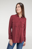 Blusa unicolor, doble bolsillo